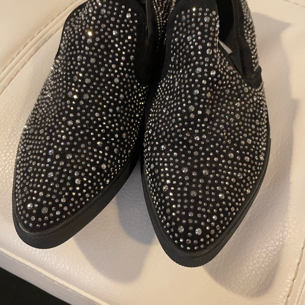 Black studded loafer excellent condition never worn.